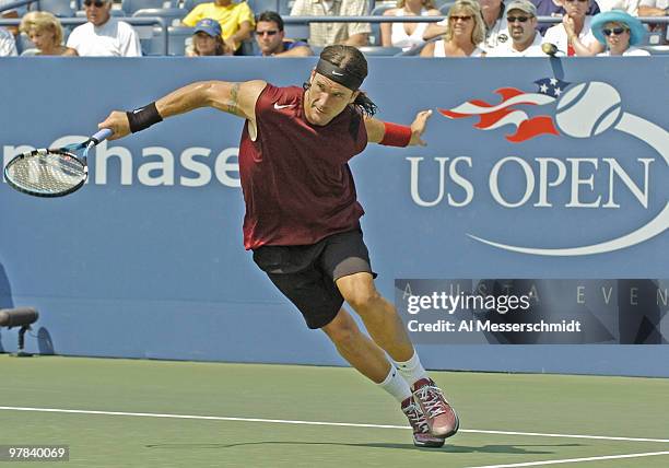 Third-seeded Carlos Moya loses to Olivier Rochus in the third round of the men's singles September 4, 2004 at the 2004 US Open in New York.