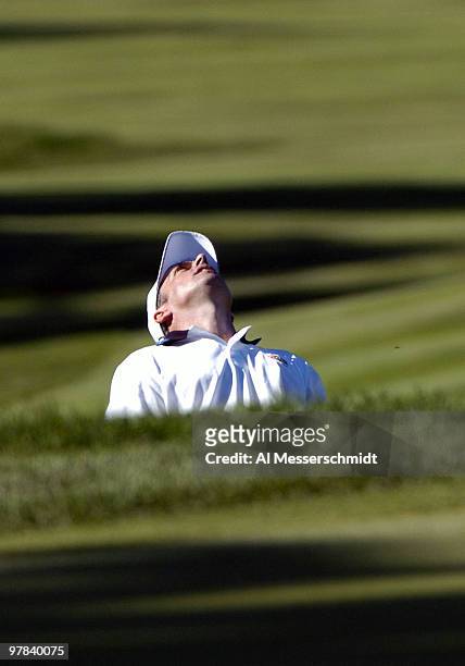 Paul McGinley misses an approach shot on the 11th hole during afternoon foursome matches at the 2004 Ryder Cup in Detroit, Michigan, September 18,...