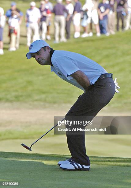 Paul McGinley looks for a putt to fall during afternoon foursome matches at the 2004 Ryder Cup in Detroit, Michigan, September 18, 2004.