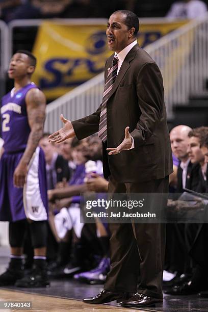 Head coach Lorenzo Romar of the Washington Huskies watches game action against the Marquette Golden Eagles during the first round of the 2010 NCAA...