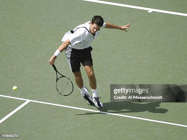 Tim Henman defeats Nicolas Kiefer in a fourth-round men's singles match September 6, 2004 at the 2004 US Open in New York.