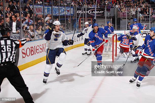 Erik Johnson of the St. Louis Blues celebrates his second period goal against the New York Rangers on March 18, 2010 at Madison Square Garden in New...