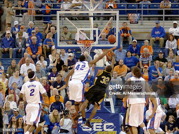 Florida center Joakim Noah blocks a shot against Alabama State at the Stephen C. O'Conner Center November 28, 2005 in Gainesville, Florida. The...