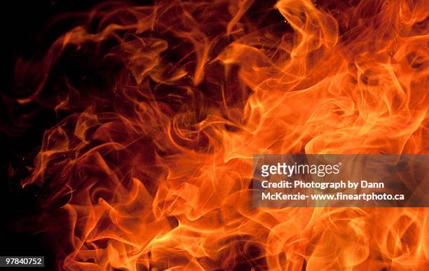 orange dancing flame - fire natural phenomenon stockfoto's en -beelden