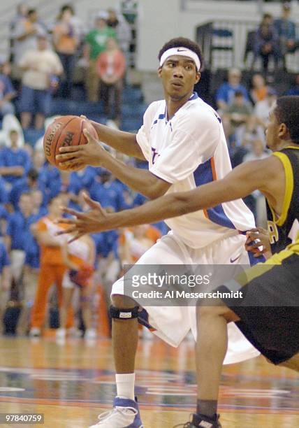 Florida guard Corey Brewer sets to pass against Alabama State at the Stephen C. O'Conner Center November 28, 2005 in Gainesville, Florida. The Gators...