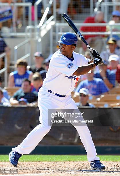 Garret Anderson of the Los Angeles Dodgers bats during a spring training game against the Chicago Cubs on March 18, 2010 at The Ballpark at Camelback...