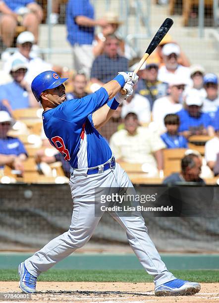 Geovany Soto of the Chicago Cubs bats during a spring training game against the Los Angeles Dodgers on March 18, 2010 at The Ballpark at Camelback...