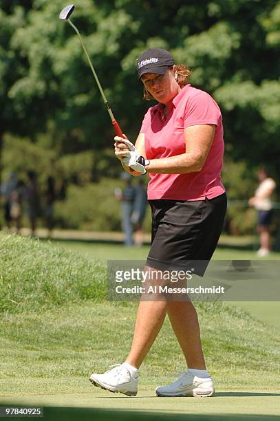 Meg Mallon putts for a birdie on the 17th green during the final round of the Jamie Farr Owens Corning Classic July 10, 2005. Bowie won the...