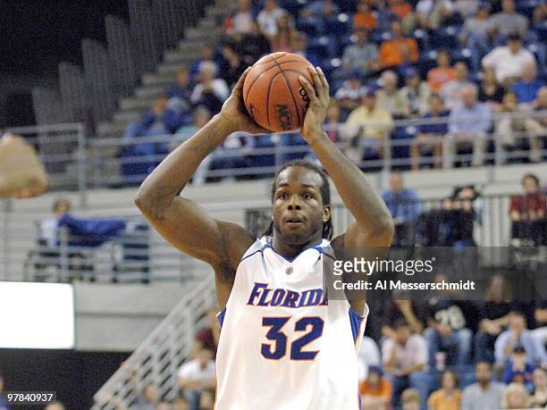 Florida forward Chris Richard releases a pass against Alabama State at the Stephen C. O'Conner Center November 28, 2005 in Gainesville, Florida. The...