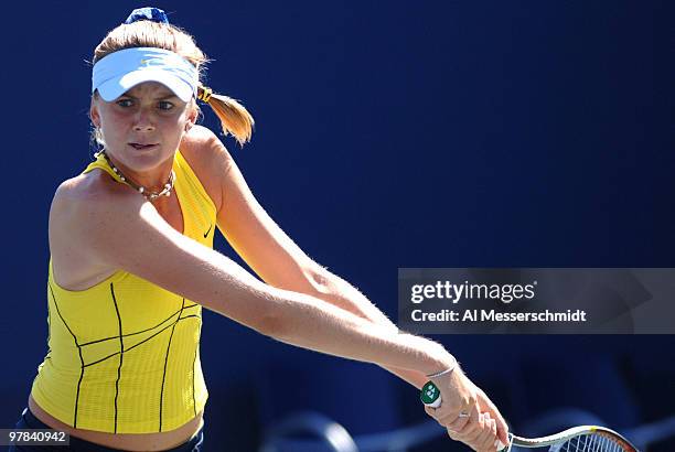 Daniela Hantuchova competes with Ai Sugiyama in a women's doubles match at the 2005 U. S. Open in Flushing, New York. Hantuchova / Sugiyama fell to...