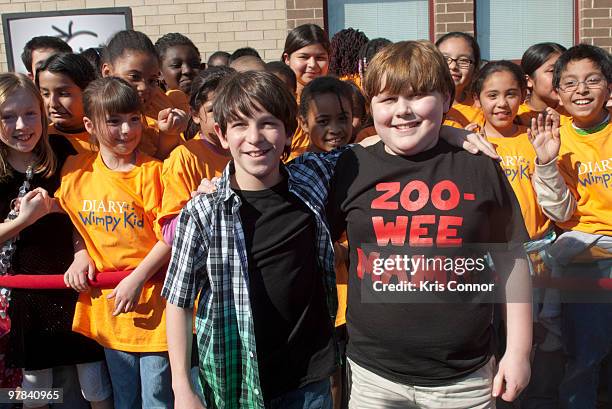 Zachary Gordon and Robert Capron pose for photographers during the premiere of "Diary Of A Wimpy Kid" at on March 18, 2010 in Alexandria, Virginia.