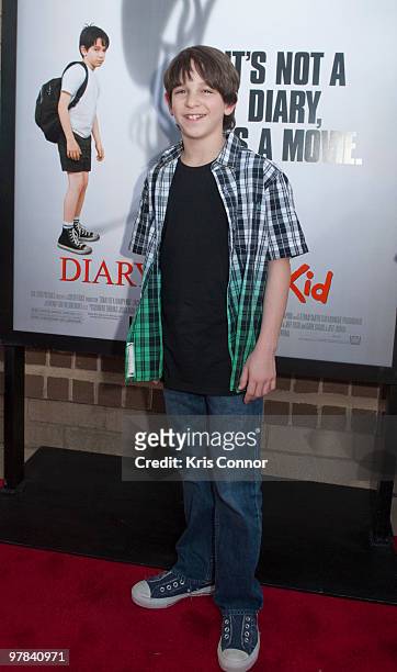 Zachary Gordon poses on the red carpet during the premiere of "Diary Of A Wimpy Kid" at on March 18, 2010 in Alexandria, Virginia.