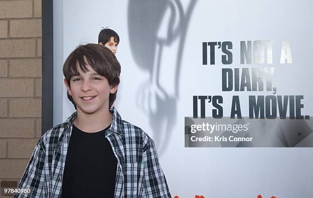 Zachary Gordon poses on the red carpet during the premiere of "Diary Of A Wimpy Kid" at on March 18, 2010 in Alexandria, Virginia.