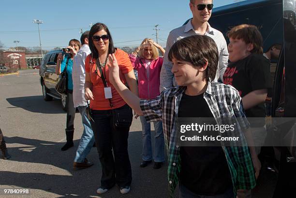 Zachary Gordon greats students during the premiere of "Diary Of A Wimpy Kid" at on March 18, 2010 in Alexandria, Virginia.