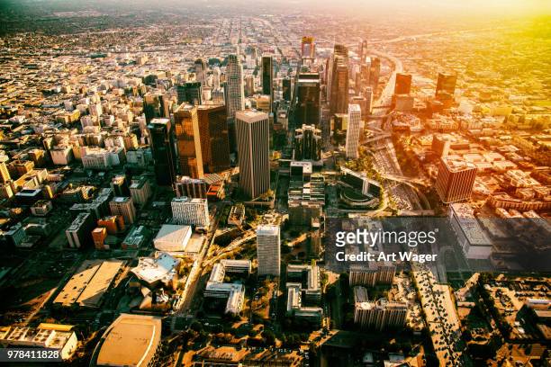 downtown los angeles at dusk - helicopter point of view stock pictures, royalty-free photos & images