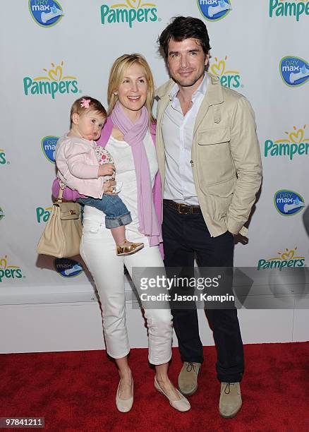 Helena Giersch, mother Kelly Rutherford and Matthew Settle attend the Pampers Dry Max launch party at Helen Mills Theater on March 18, 2010 in New...
