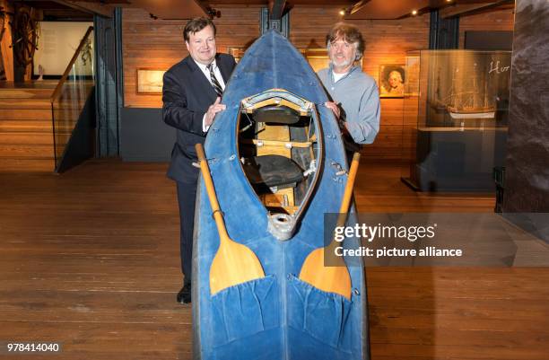 April 2018, Germany, Hamburg: The polar researcher Arved Fuchs and the director of the International Maritime Museum, Peter Tamm, standing beside...
