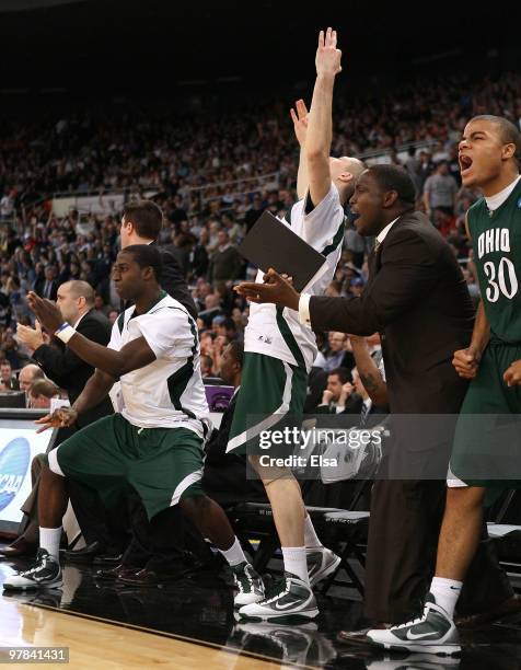 The Ohio Bobcats bench celebrates late in the second half against the Georgetown Hoyas during the first round of the 2010 NCAA men's basketball...