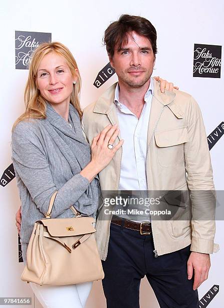 Actors Kelly Rutherford and Matthew Settle attend the Alice+Olivia launch party at Saks Fifth Avenue on March 18, 2010 in New York City.