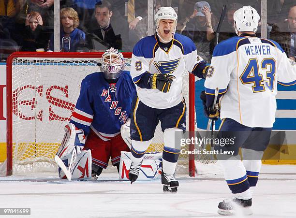 Paul Kariya of the St. Louis Blues celebrates his game winning goal against Henrik Lundqvist of the New York Rangers in the third period on March 18,...