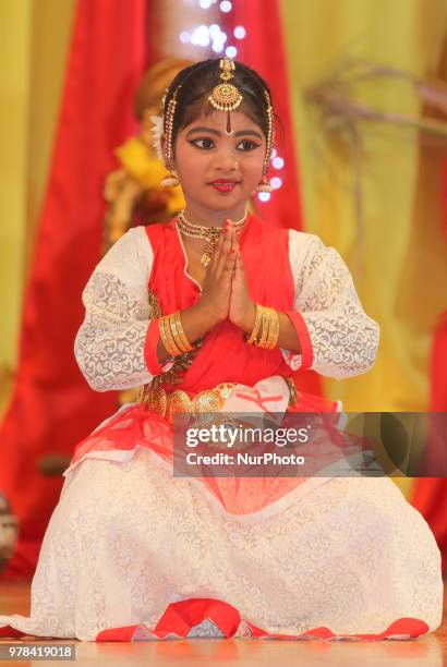 Tamil Bharatnatyam dancer performs a fusion dance mixing traditional styles with modern elements during a cultural program celebrating Tamil Heritage...