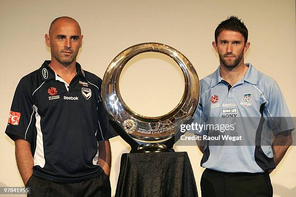 Melbourne Victory captain Kevin Muscat and Sydney FC player Terry McFlynn poses during an A-League Grand Final press conference at the Crown...