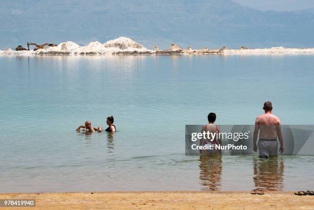 Tourists in the Dead Sea in Israel on June 17, 2018. The Dead Sea is a popular travel destination and lies 422 meters below sea level, which makes it...