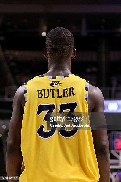 Forward Jimmy Butler of the Marquette Golden Eagles stands on the court during their game against the Washington Huskies in the first round of the...