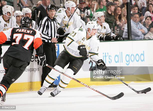 Loui Eriksson of the Dallas Stars handles the puck against Ryan Parent of the Philadelphia Flyers on March 18, 2010 at the American Airlines Center...
