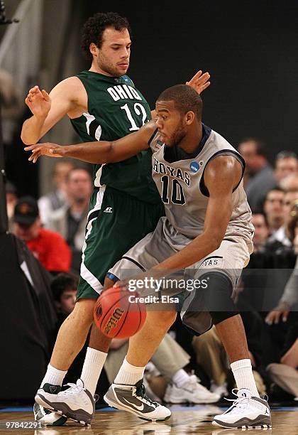 Greg Monroe of the Georgetown Hoyas tries to get around Kenneth van Kempen of the Ohio Bobcats during the first round of the 2010 NCAA men's...