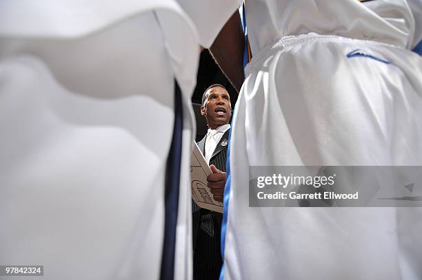 Assistant head coach Adrian Dantley of the Denver Nuggets gets his team together prior to the game against the New Orleans Hornets on March 18, 2010...