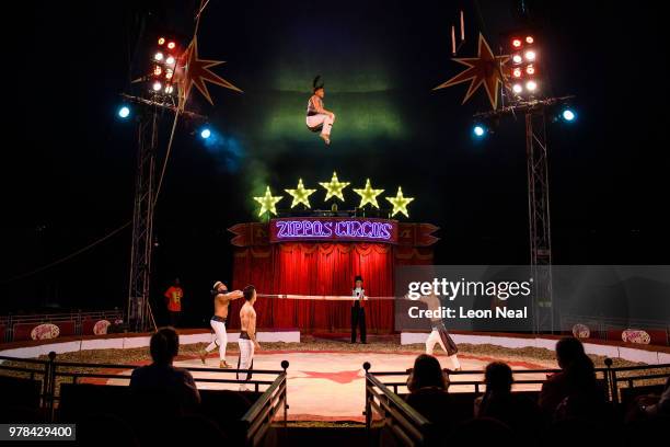 Members of the Havana Quartet group of acrobats take part in a performance at Zippo's circus in Victoria Park on June 13, 2018 in Glasgow, Scotland....