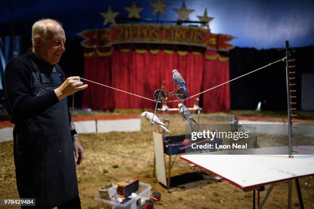 Ringmaster Norman Barrett rehearses with his budgerigars ahead of a matinee performance at Zippo's circus in Victoria Park on June 15, 2018 in...
