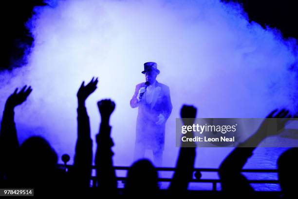 Ringmaster Norman Barrett stands within a cloud of dry ice during a performance at Zippo's circus in Victoria Park on June 13, 2018 in Glasgow,...
