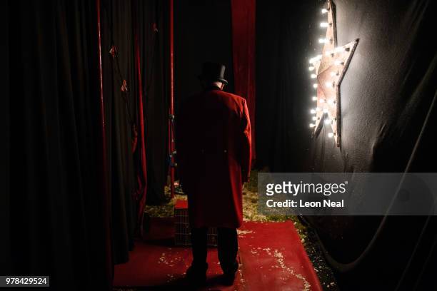 Ringmaster Norman Barrett waits backstage to enter the ring during a performance at Zippo's circus in Victoria Park on June 13, 2018 in Glasgow,...
