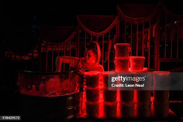 Holly Jane Faulkner of England prepares candy floss, ahead of a performance at Zippo's circus in Victoria Park on June 13, 2018 in Glasgow, Scotland....