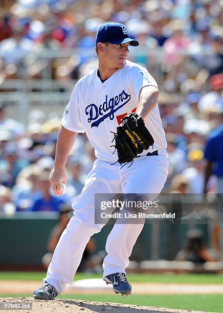 Chad Billingsley of the Los Angeles Dodgers pitches during a spring training game against the Chicago Cubs on March 18, 2010 at The Ballpark at...