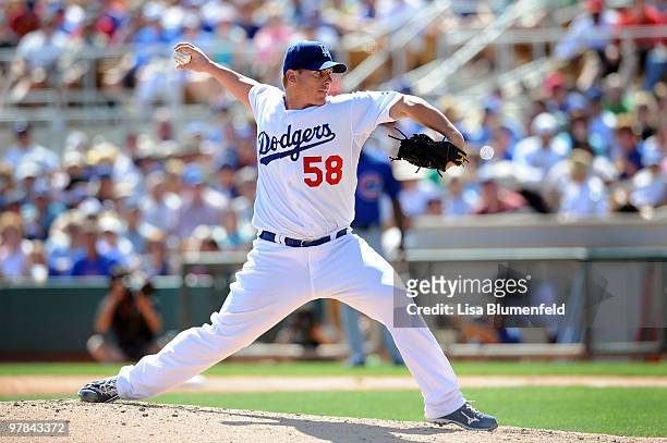 Chad Billingsley of the Los Angeles Dodgers pitches during a spring training game against the Chicago Cubs on March 18, 2010 at The Ballpark at...