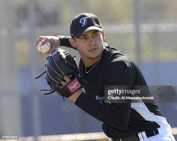 Pitcher Dustin McGowan throws to first base during a Toronto Blue Jays spring training practice in Dunedin, Florida on February 20, 2007.