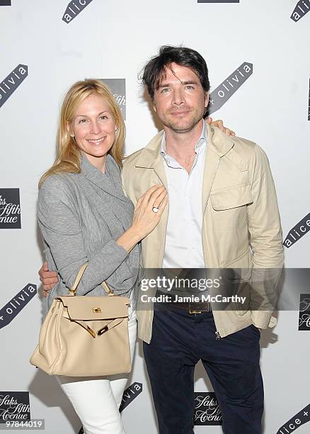 Kelly Rutherford and Mathew Settle attend the Alice+Olivia launch party at Saks Fifth Avenue on March 18, 2010 in New York City.
