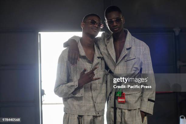 Models are seen backstage ahead of the Represent CLO show during Milan Men's Fashion Week Spring/Summer 2019.