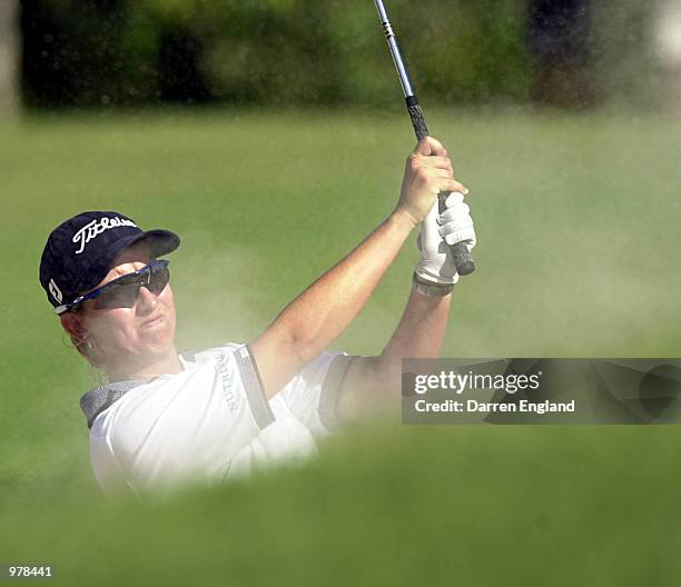 Karrie Webb of Australia hits out of a bunker on the 17th fairway during the final round at the ANZ Australian Ladies Masters Golf at Royal Pines...