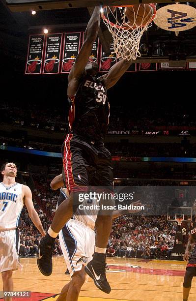 Joel Anthony of the Miami Heat dunks against the Orlando Magic on March 18, 2010 at American Airlines Arena in Miami, Florida. NOTE TO USER: User...