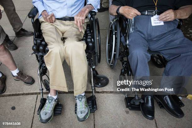 Washington, D.C. Former Senator Bob Dole, R-Kansas, and Korean Air Force veteran Alfred Clark of Tennessee visit at the National World War II...