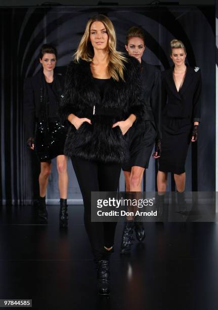 Model Jennifer Hawkins showcases designs on the catwalk at the Myer Autumn/Winter 2010 fashion show at Westfield Bondi Junction on March 19, 2010 in...