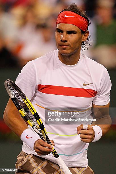 Rafael Nadal of Spain celebrates a point against Tomas Berdych of the Czech Republic during the BNP Paribas Open on March 18, 2010 at the Indian...