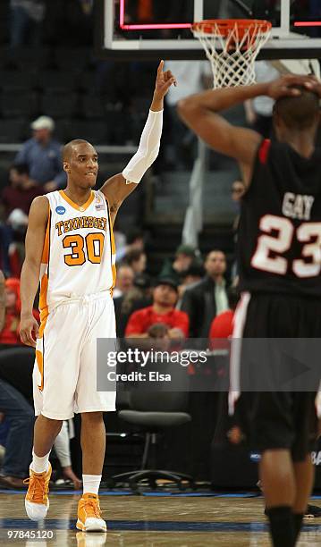 Prince of the Tennessee Volunteers celebrates the win as D.J. Gay of the San Diego State Aztecs looks on during the first round of the 2010 NCAA...