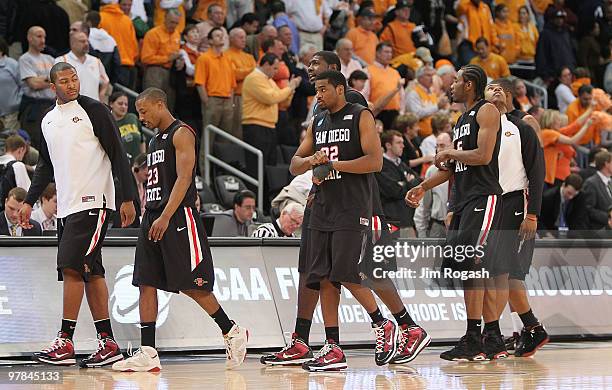 Members of the San Diego State Aztecs leave the court after a 62-59 loss to the Tennessee Volunteers during the first round of the 2010 NCAA men's...