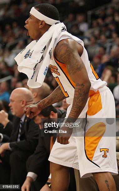 Melvin Goins of the Tennessee Volunteers celebrates from the bench in the second half against the San Diego State Aztecs during the first round of...