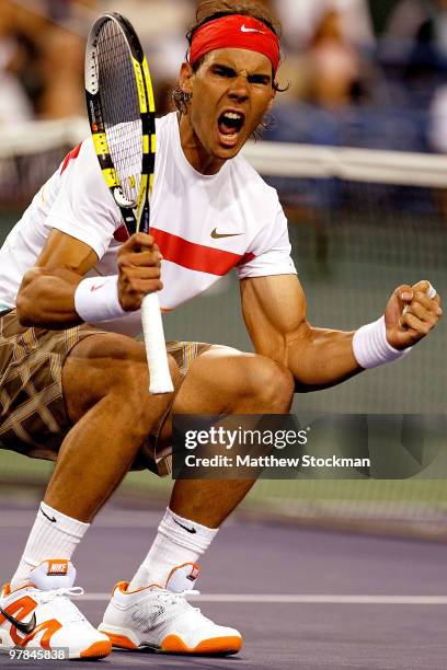 Rafael Nadal of Spain celebrates match point against Tomas Berdych of the Czech Republic during the BNP Paribas Open on March 18, 2010 at the Indian...